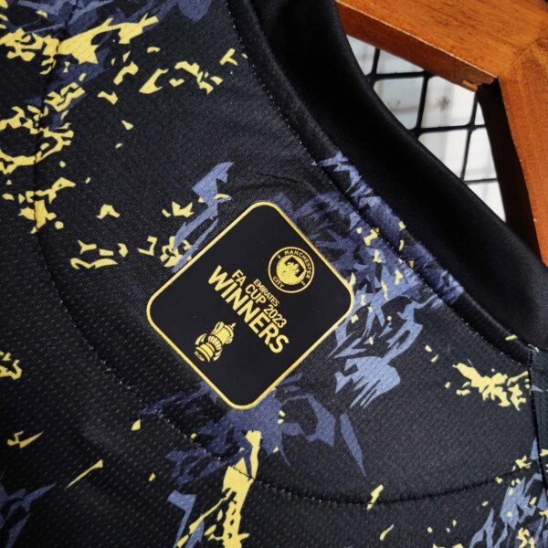 23-24 Manchester City Black and Gold Jersey - Image 2