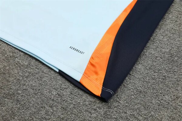24-25 Real Madrid Light Blue and Orange Training Suit - Image 4